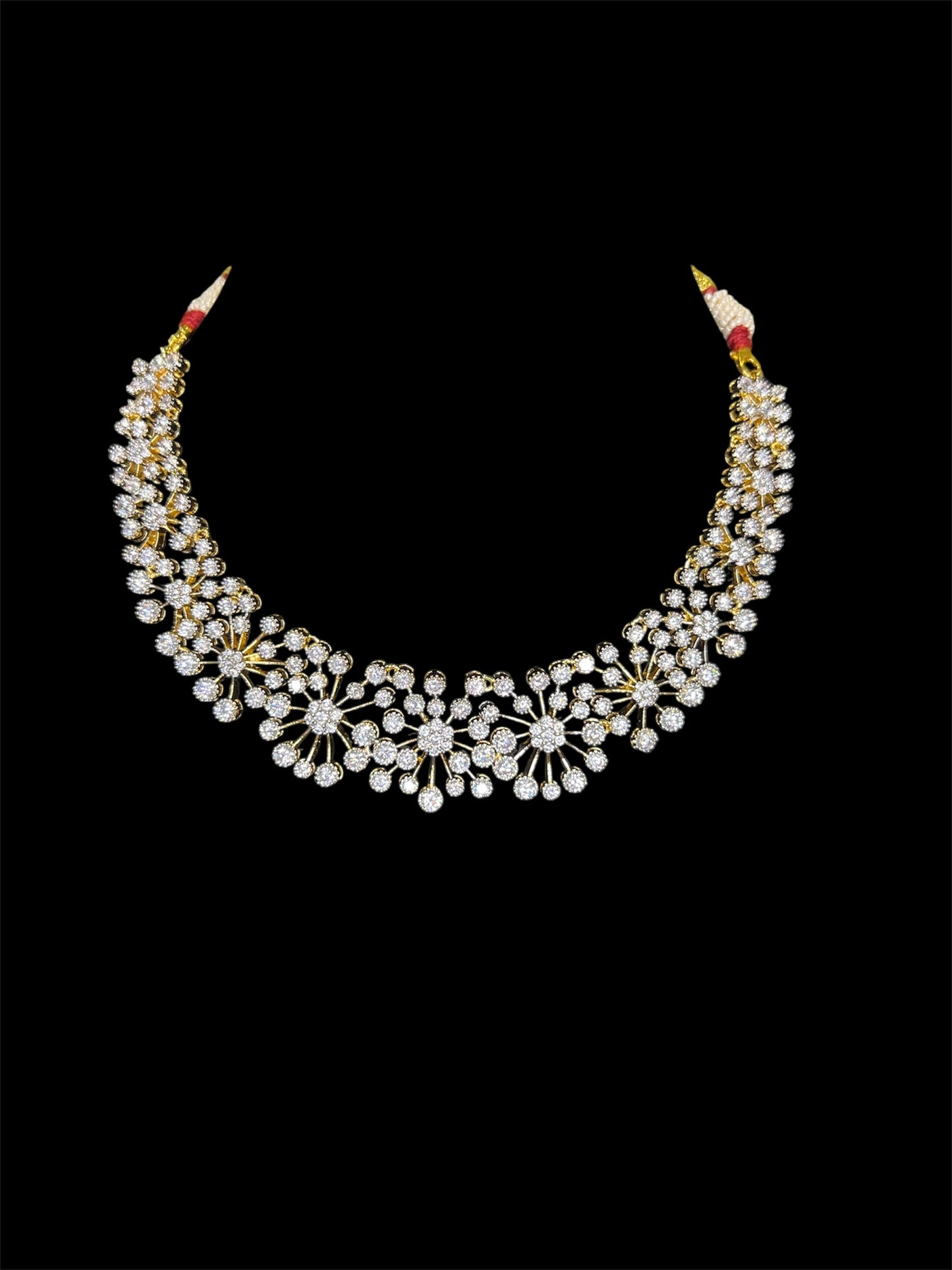 Diamond look starburst necklace