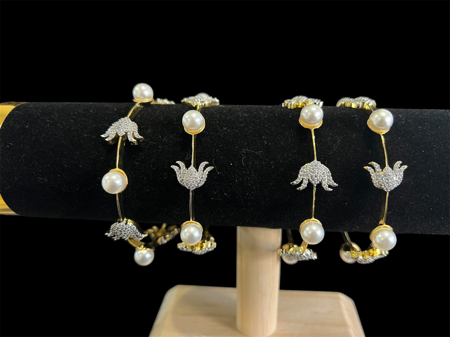 Pearl and lotus bangles