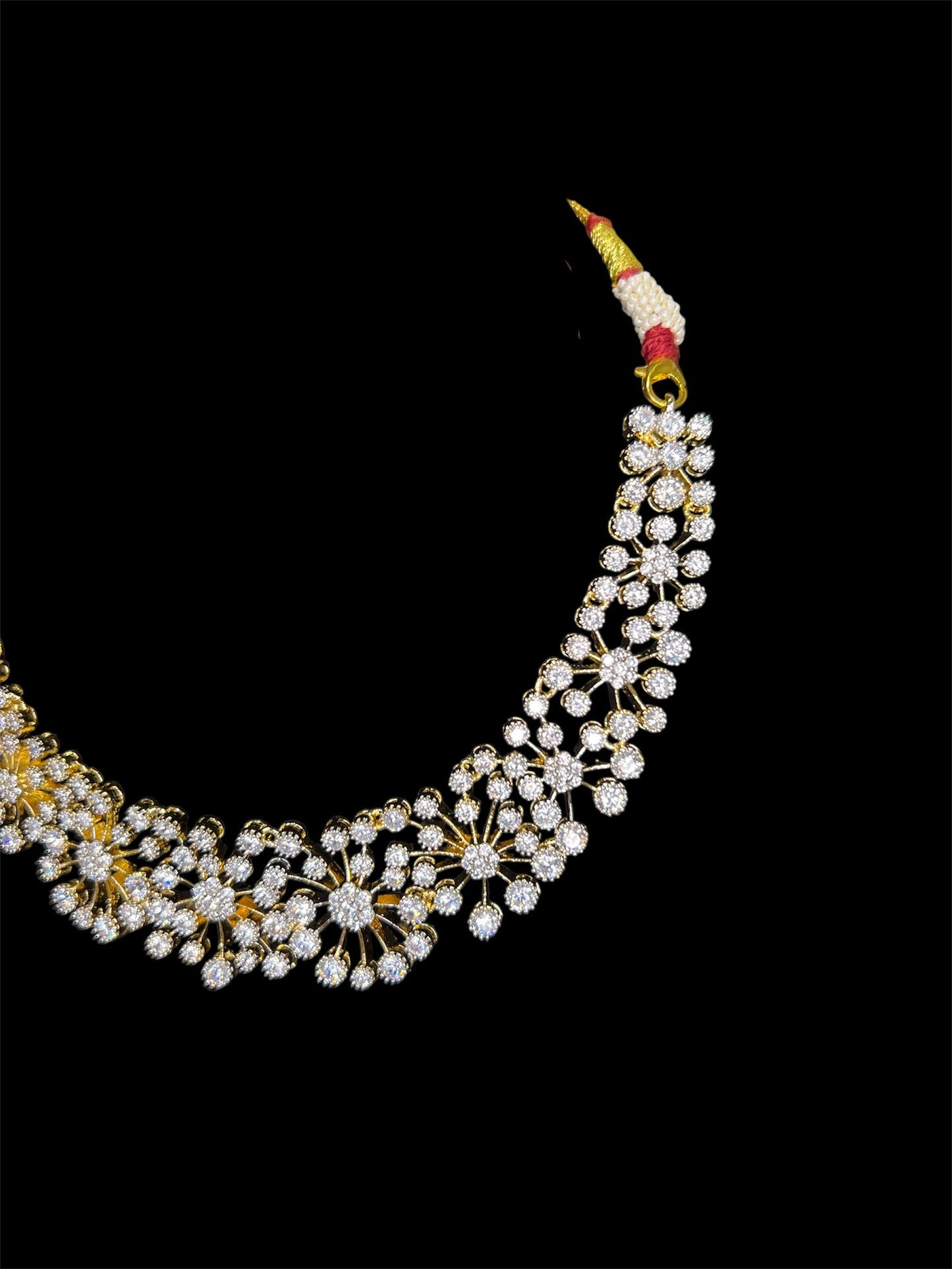 Diamond look starburst necklace